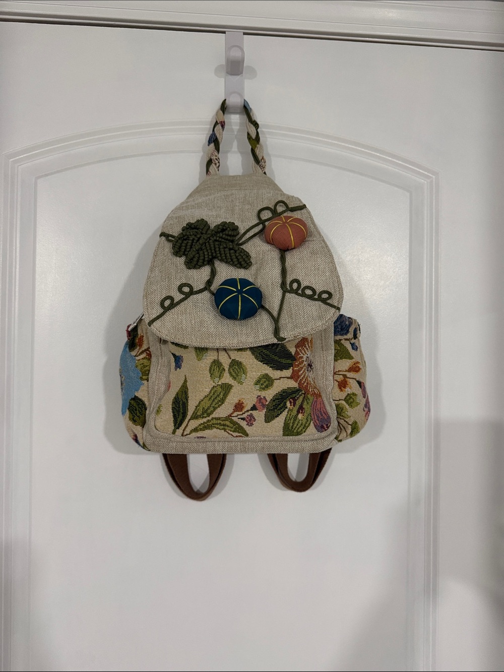 Hand Crafted Beige Floral Embroidered Backpack with Blue & Orange Accents